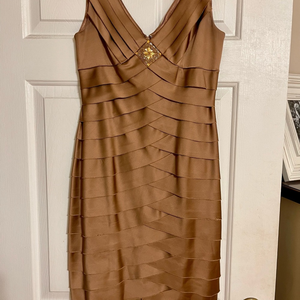 Beautiful bronze cocktail dress . Pre loved